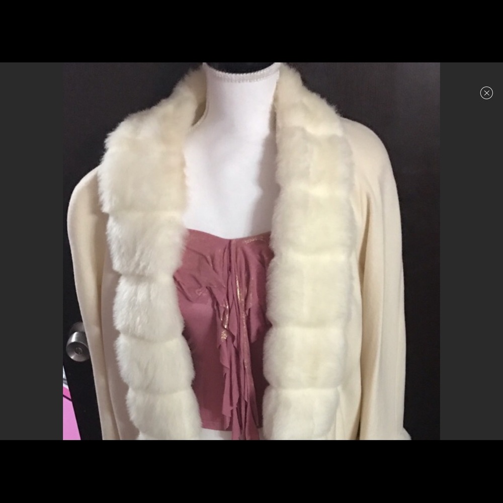 Mid calf cream coat.